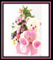 Canasta floral con peluche grande
